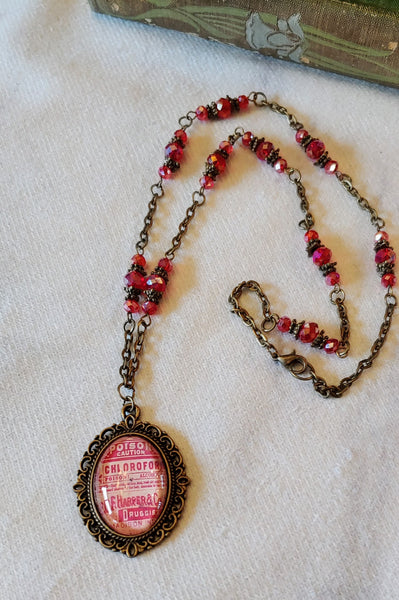 Red Poison Bottle Label Cameo Necklace